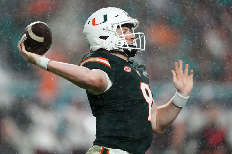 Nov 20, 2021; Miami Gardens, Florida, USA; Miami Hurricanes quarterback Tyler Van Dyke (9) attempts a pass against the Virginia Tech Hokies during the second half at Hard Rock Stadium. Mandatory Credit: Jasen Vinlove-USA TODAY Sports