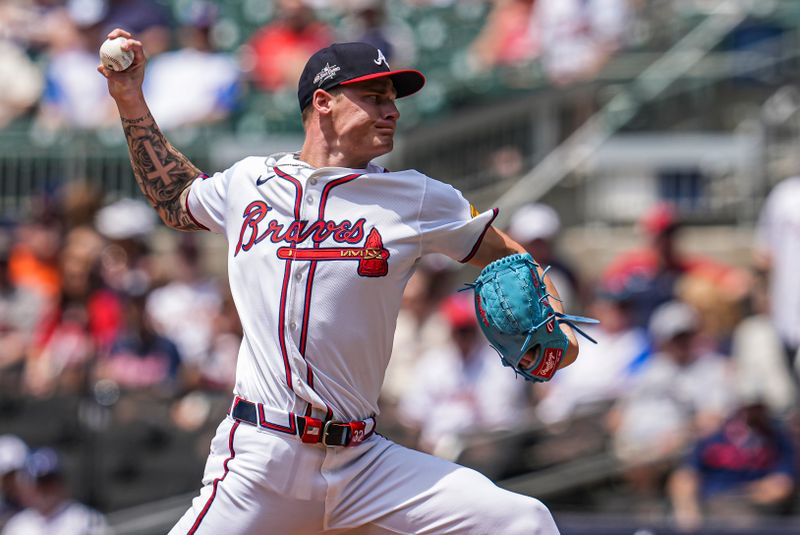 May 15, 2025; Cumberland, Georgia, USA; Atlanta Braves pitcher AJ Smith-Shawver (32) pitches against the Washington Nationals during the second inning at Truist Park. Mandatory Credit: Dale Zanine-Imagn Images