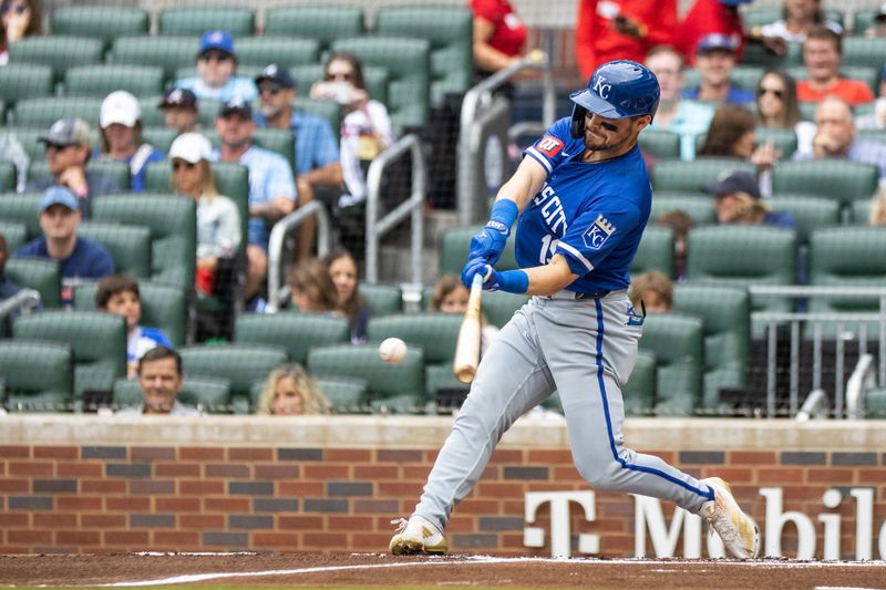 Sep 29, 2024; Cumberland, Georgia, USA; Kansas City Royals second baseman Michael Massey (19) hits a home run against Atlanta Braves during the first inning at Truist Park. Mandatory Credit: Jordan Godfree-Imagn Images