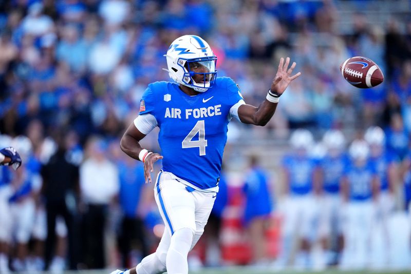 Sep 23, 2022; Colorado Springs, Colorado, USA; Air Force Falcons quarterback Haaziq Daniels (4) option passes the ball in the first quarter against the Nevada Wolf Pack at Falcon Stadium. Mandatory Credit: Ron Chenoy-USA TODAY Sports