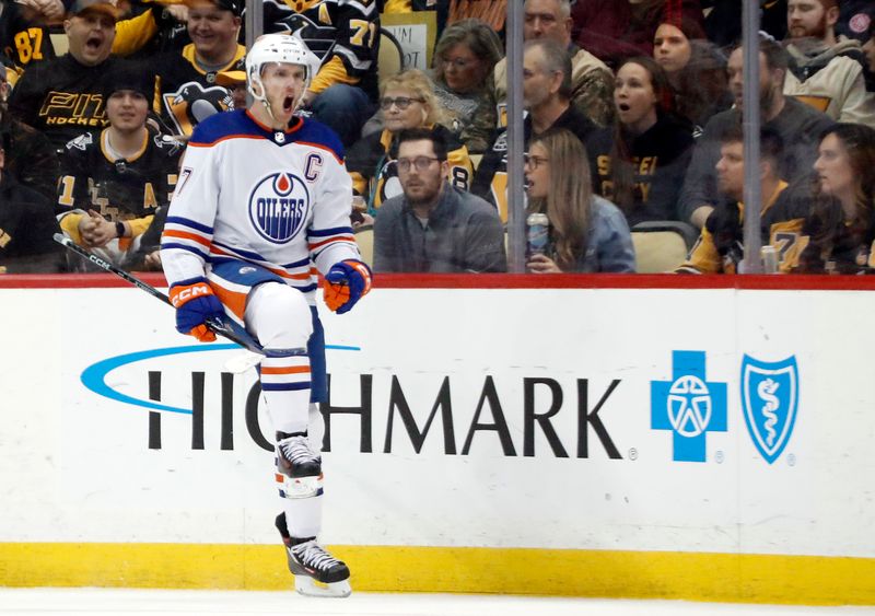 Feb 23, 2023; Pittsburgh, Pennsylvania, USA; Edmonton Oilers center Connor McDavid (97) reacts after scoring a goal against the Pittsburgh Penguins during the first period at PPG Paints Arena. Mandatory Credit: Charles LeClaire-USA TODAY Sports