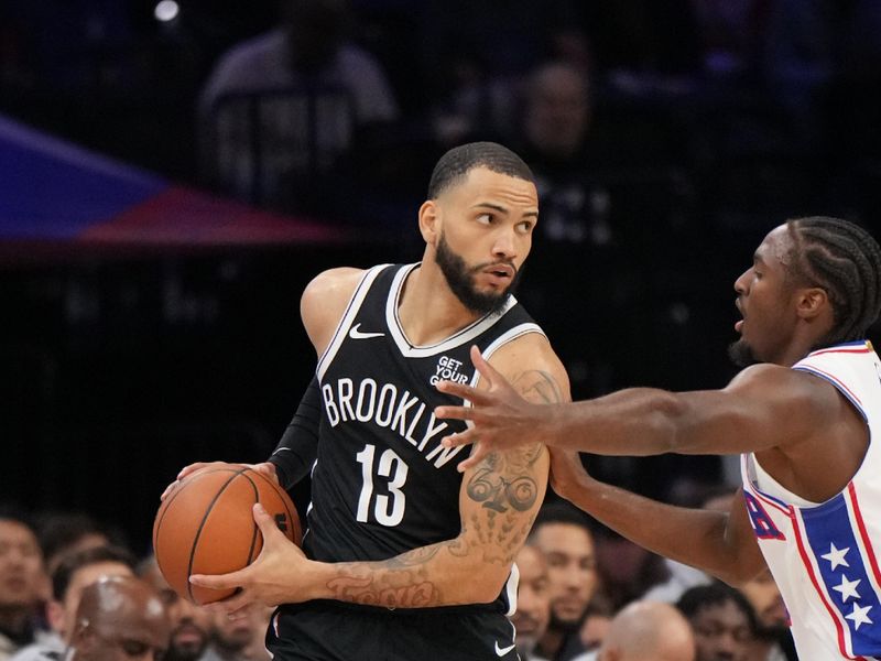 PHILADELPHIA, PA - OCTOBER 16: Tyrese Martin #13 of the Brooklyn Nets handles the ball during the game against the Philadelphia 76ers during a NBA preseason game on October 16, 2024 at the Wells Fargo Center in Philadelphia, Pennsylvania NOTE TO USER: User expressly acknowledges and agrees that, by downloading and/or using this Photograph, user is consenting to the terms and conditions of the Getty Images License Agreement. Mandatory Copyright Notice: Copyright 2024 NBAE (Photo by Jesse D. Garrabrant/NBAE via Getty Images)