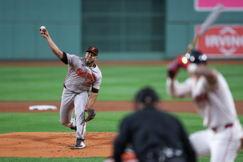 Sep 10, 2024; Boston, Massachusetts, USA; Baltimore Orioles starting pitcher Albert Suarez (49) throws a pitch during the first inning against the Boston Red Sox at Fenway Park. Mandatory Credit: Paul Rutherford-Imagn Images