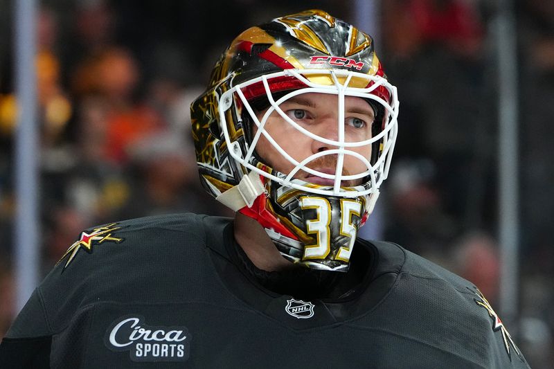 Oct 13, 2024; Las Vegas, Nevada, USA; Vegas Golden Knights goaltender Ilya Samsonov (35) skates during a stoppage in play against the Anaheim Ducks during the third period at T-Mobile Arena. Mandatory Credit: Stephen R. Sylvanie-Imagn Images