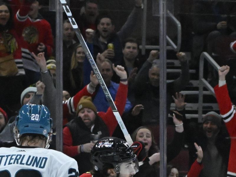 Jan 16, 2024; Chicago, Illinois, USA; Chicago Blackhawks center Cole Guttman (70) reacts after scoring a goal against the San Jose Sharks during the first period at United Center. Mandatory Credit: Matt Marton-USA TODAY Sports