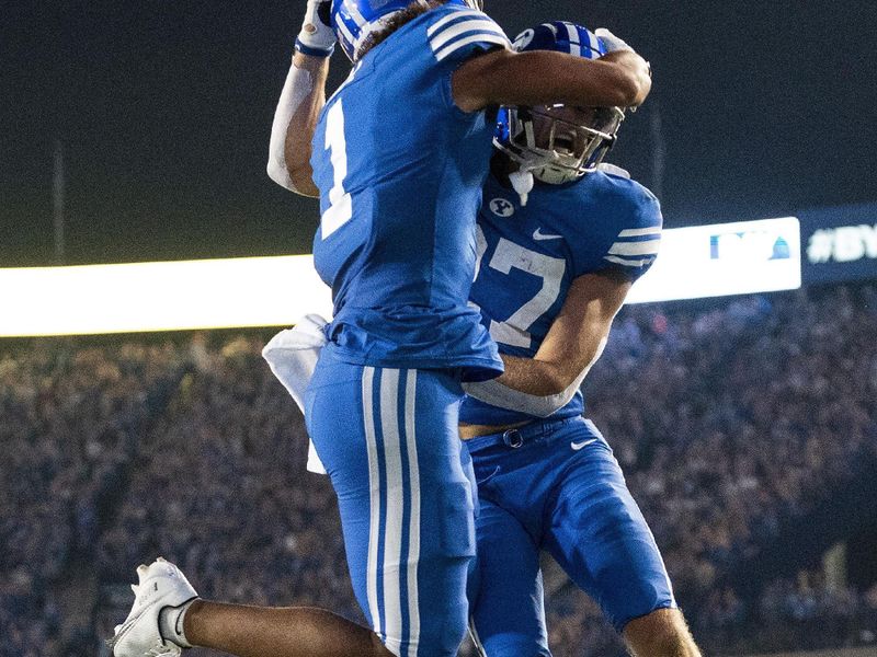 Sep 10, 2022; Provo, Utah, USA; Brigham Young Cougars wide receiver Keanu Hill (1) celebrates with wide receiver Chase Roberts (27) after a touchdown against the Baylor Bears in the second quarter at LaVell Edwards Stadium. Mandatory Credit: Gabriel Mayberry-USA TODAY Sports