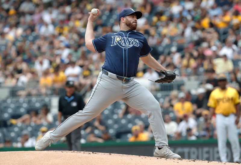 Jun 23, 2024; Pittsburgh, Pennsylvania, USA;  Tampa Bay Rays starting pitcher Aaron Civale (34) delivers a pitch against the Pittsburgh Pirates during the first inning at PNC Park. Mandatory Credit: Charles LeClaire-USA TODAY Sports