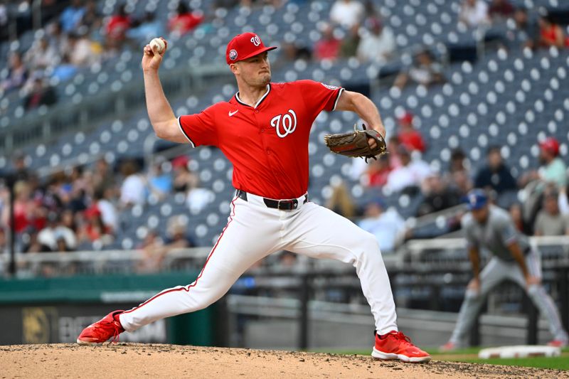 Jun 8, 2025; Washington, District of Columbia, USA; Washington Nationals relief pitcher Brad Lord (61) throws to the Texas Rangers during the fifth inning at Nationals Park. Mandatory Credit: Brad Mills-Imagn Images