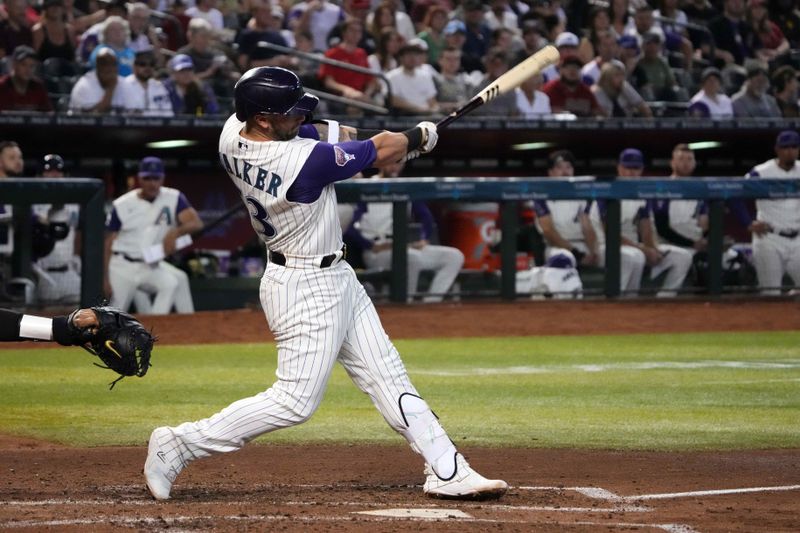 Aug 12, 2023; Phoenix, Arizona, USA; Arizona Diamondbacks first baseman Christian Walker (53) hits a two run home run against the San Diego Padres during the third inning at Chase Field. Mandatory Credit: Joe Camporeale-USA TODAY Sports