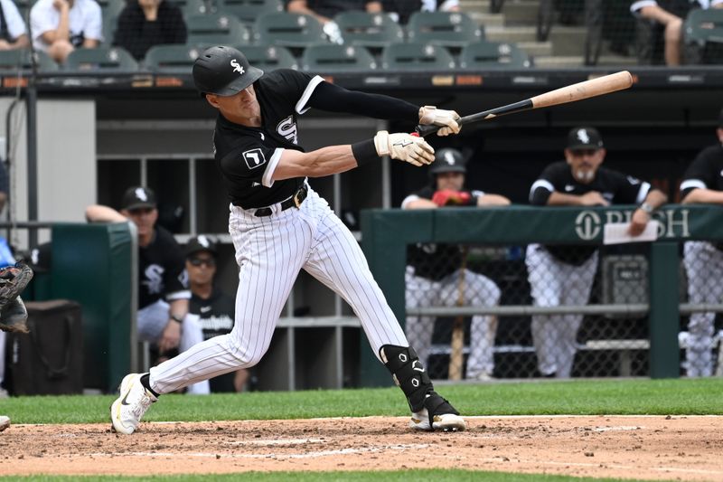 Jul 6, 2023; Chicago, Illinois, USA;  Chicago White Sox shortstop Zach Remillard (28) strikes out swinging during the sixth inning against the Toronto Blue Jays  at Guaranteed Rate Field. Mandatory Credit: Matt Marton-USA TODAY Sports