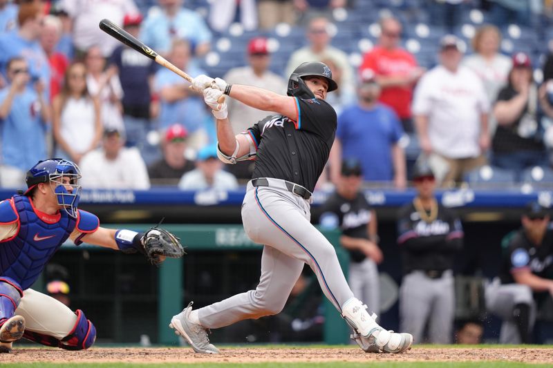 Apr 19, 2025; Philadelphia, Pennsylvania, USA; Miami Marlins infielder Graham Pauley (21) hits an RBI double against the Philadelphia Phillies in the ninth inning at Citizens Bank Park. Mandatory Credit: Kyle Ross-Imagn Images