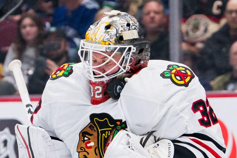 Apr 6, 2023; Vancouver, British Columbia, CAN; Chicago Blackhawks goalie Alex Stalock (32) makes a save against the Vancouver Canucks in the third period at Rogers Arena. Canucks won 3-0. Mandatory Credit: Bob Frid-USA TODAY Sports