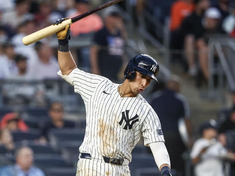 Jun 22, 2024; Bronx, New York, USA;  New York Yankees third baseman Oswaldo Cabrera (95) reacts after popping out to end the fourth inning against the Atlanta Braves at Yankee Stadium. Mandatory Credit: Wendell Cruz-USA TODAY Sports