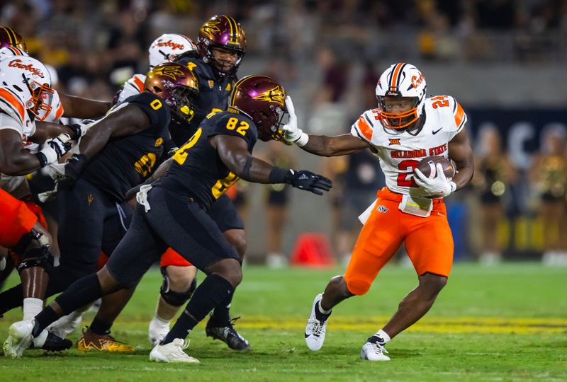 Sep 9, 2023; Tempe, Arizona, USA; Oklahoma State Cowboys running back Elijah Collins (24) against the Arizona State Sun Devils in the second half at Mountain America Stadium. Mandatory Credit: Mark J. Rebilas-USA TODAY Sports