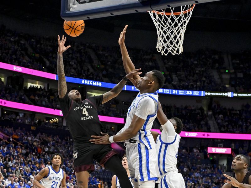 Mar 15, 2024; Nashville, TN, USA; Kentucky Wildcats forward Tre Mitchell (4) shoots over Kentucky Wildcats forward Ugonna Onyenso (33) during the first half at Bridgestone Arena. Mandatory Credit: Steve Roberts-USA TODAY Sports