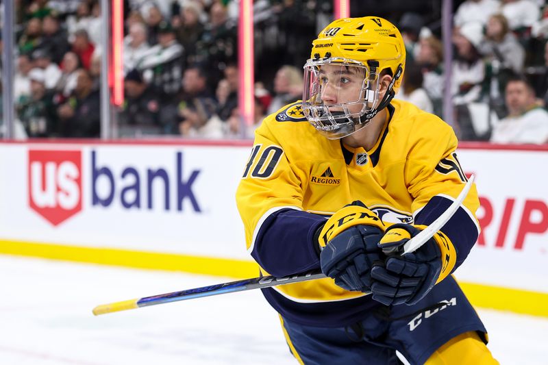 Nov 30, 2024; Saint Paul, Minnesota, USA; Nashville Predators center Fedor Svechkov (40) celebrates his goal against the Minnesota Wild during the first period at Xcel Energy Center. Mandatory Credit: Matt Krohn-Imagn Images