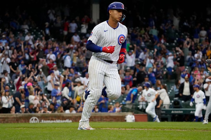 Sep 22, 2024; Chicago, Illinois, USA; Chicago Cubs catcher Miguel Amaya (9) runs the bases after hitting a two-run home run against the Washington Nationals during the fourth inning at Wrigley Field. Mandatory Credit: David Banks-Imagn Images