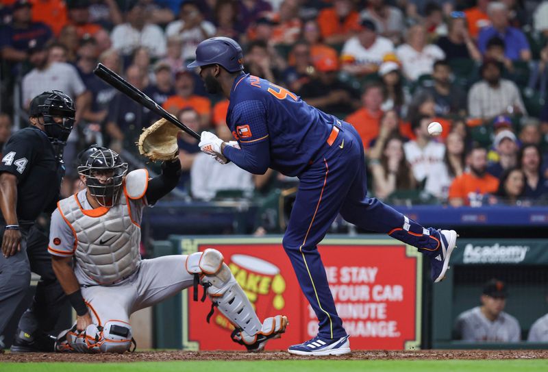 May 1, 2023; Houston, Texas, USA; Houston Astros designated hitter Yordan Alvarez (44) is hit by a pitch during the sixth inning against the San Francisco Giants at Minute Maid Park. Mandatory Credit: Troy Taormina-USA TODAY Sports