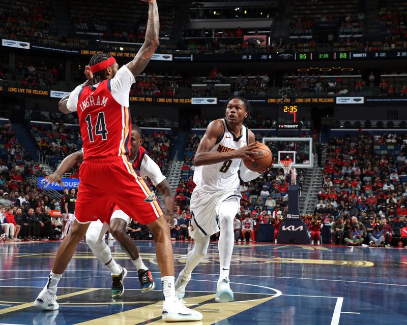 NEW ORLEANS, LA - NOVEMBER 15: Peyton Watson #8 of the Denver Nuggets drives to the basket during the game against the New Orleans Pelicans during the Emirates NBA Cup game on November 15, 2024 at the Smoothie King Center in New Orleans, Louisiana. NOTE TO USER: User expressly acknowledges and agrees that, by downloading and or using this Photograph, user is consenting to the terms and conditions of the Getty Images License Agreement. Mandatory Copyright Notice: Copyright 2024 NBAE (Photo by Layne Murdoch Jr./NBAE via Getty Images)