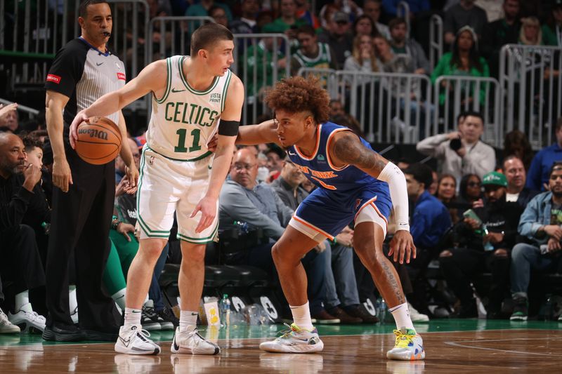 BOSTON, MA - APRIL 11: Payton Pritchard #11 of the Boston Celtics dribbles the ball during the game against the New York Knicks on April 11, 2024 at the TD Garden in Boston, Massachusetts. NOTE TO USER: User expressly acknowledges and agrees that, by downloading and or using this photograph, User is consenting to the terms and conditions of the Getty Images License Agreement. Mandatory Copyright Notice: Copyright 2024 NBAE  (Photo by Nathaniel S. Butler/NBAE via Getty Images)