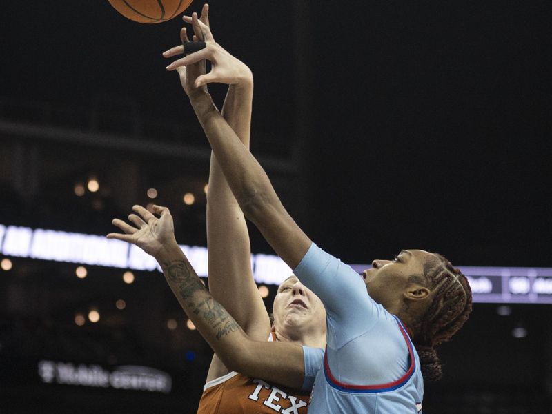 Mar 9, 2024; Kansas City, MO, USA; Texas Longhorns forward Taylor Jones (44) tries to block a shot by Kansas Jayhawks center Taiyanna Jackson (1) during the first half at T-Mobile Center. Mandatory Credit: Amy Kontras-USA TODAY Sports