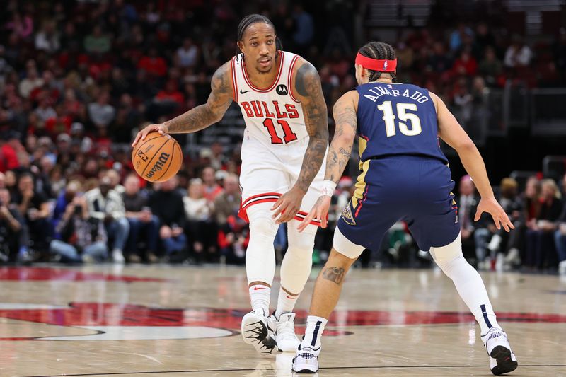 CHICAGO, ILLINOIS - DECEMBER 02: DeMar DeRozan #11 of the Chicago Bulls dribbles against Jose Alvarado #15 of the New Orleans Pelicans during the first half at the United Center on December 02, 2023 in Chicago, Illinois. NOTE TO USER: User expressly acknowledges and agrees that, by downloading and or using this photograph, User is consenting to the terms and conditions of the Getty Images License Agreement.  (Photo by Michael Reaves/Getty Images)