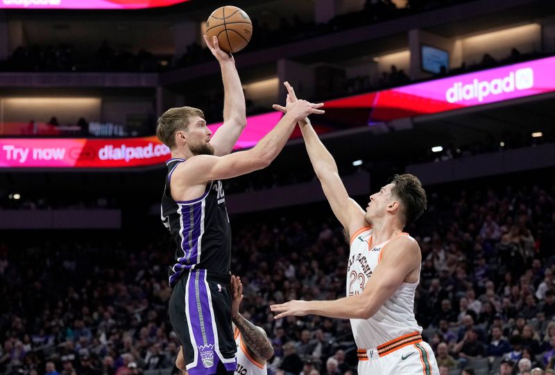 SACRAMENTO, CALIFORNIA - MARCH 07: Domantas Sabonis #10 of the Sacramento Kings shoots over Zach Collins #23 of the San Antonio Spurs during the second half at Golden 1 Center on March 07, 2024 in Sacramento, California. NOTE TO USER: User expressly acknowledges and agrees that, by downloading and or using this photograph, User is consenting to the terms and conditions of the Getty Images License Agreement. (Photo by Thearon W. Henderson/Getty Images)