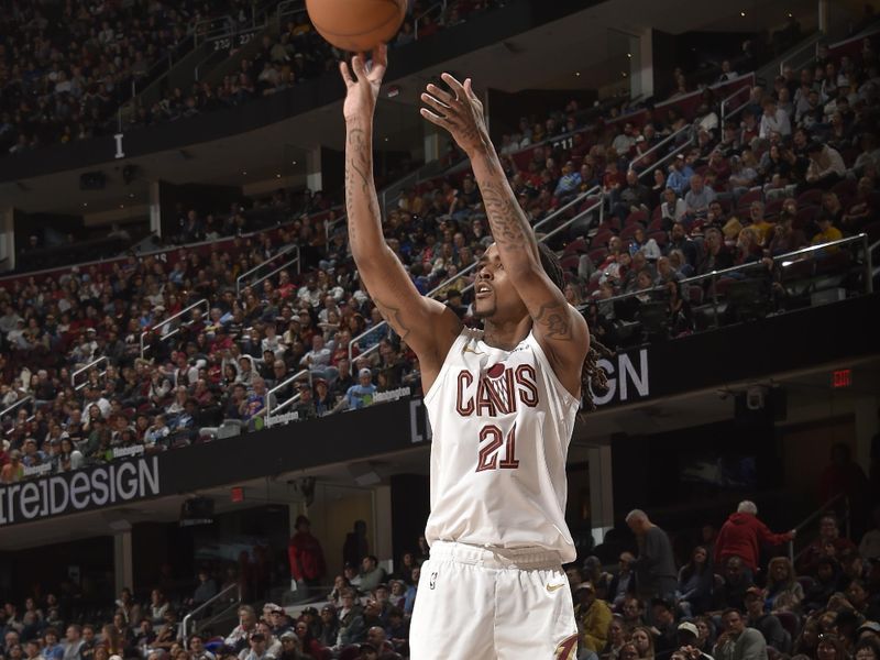 CLEVELAND, OH - APRIL 13: Emoni Bates #21 of the Cleveland Cavaliers shoots a three point basket during the game against the Indiana Pacers  on April 13, 2025 at Rocket Arena in Cleveland, Ohio. NOTE TO USER: User expressly acknowledges and agrees that, by downloading and/or using this Photograph, user is consenting to the terms and conditions of the Getty Images License Agreement. Mandatory Copyright Notice: Copyright 2025 NBAE (Photo by David Liam Kyle/NBAE via Getty Images)
