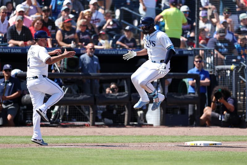 Apr 13, 2025; Tampa, Florida, USA; Tampa Bay Rays third baseman Junior Caminero (13) celebrates after hitting a three run home run against the Atlanta Braves in the sixth inning at George M. Steinbrenner Field. Mandatory Credit: Nathan Ray Seebeck-Imagn Images