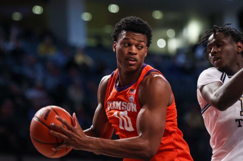 Feb 21, 2024; Atlanta, Georgia, USA; Clemson Tigers forward RJ Godfrey (10) grabs a rebound against the Georgia Tech Yellow Jackets in the second half at McCamish Pavilion. Mandatory Credit: Brett Davis-USA TODAY Sports
