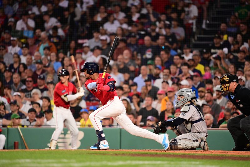 Jun 14, 2024; Boston, Massachusetts, USA; Boston Red Sox center fielder Ceddanne Rafaela (43) hits a single against the New York Yankees during the third inning at Fenway Park. Mandatory Credit: Eric Canha-USA TODAY Sports