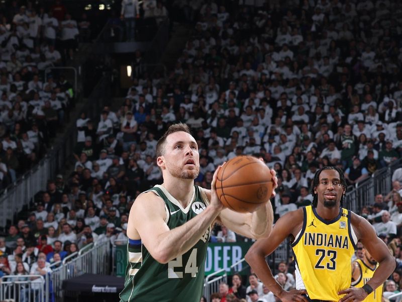 MILWAUKEE, WI - APRIL 23: Pat Connaughton #24 of the Milwaukee Bucks shoots a free throw during Round 1 Game 2 of the 2024 NBA Playoffs against the Indiana Pacers on April 23, 2024 at the Fiserv Forum Center in Milwaukee, Wisconsin. NOTE TO USER: User expressly acknowledges and agrees that, by downloading and or using this Photograph, user is consenting to the terms and conditions of the Getty Images License Agreement. Mandatory Copyright Notice: Copyright 2024 NBAE (Photo by Jeff Haynes/NBAE via Getty Images).