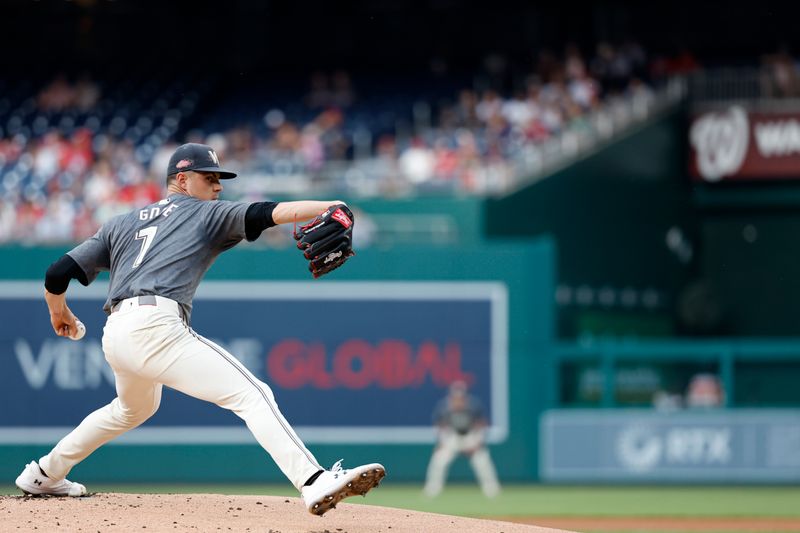 Jul 20, 2024; Washington, District of Columbia, USA; Washington Nationals starting pitcher MacKenzie Gore (1) pitches against the Cincinnati Reds during the first inning at Nationals Park. Mandatory Credit: Geoff Burke-USA TODAY Sports