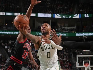 MILWAUKEE, WI - NOVEMBER 13: Damian Lillard #0 of the Milwaukee Bucks drives to the basket during the game against the Chicago Bulls on November 13, 2023 at the Fiserv Forum in Milwaukee, Wisconsin. NOTE TO USER: User expressly acknowledges and agrees that, by downloading and or using this Photograph, user is consenting to the terms and conditions of the Getty Images License Agreement. Mandatory Copyright Notice: Copyright 2023 NBAE (Photo by Gary Dineen/NBAE via Getty Images).