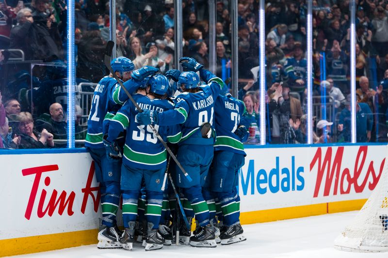 Apr 14, 2026; Vancouver, British Columbia, CAN; The Vancouver Canucks celebrate their victory against the Los Angeles Kings in overtime at Rogers Arena. Mandatory Credit: Bob Frid-Imagn Images Apr 14, 2026; Vancouver, British Columbia, CAN; The Vancouver Canucks celebrate their victory against the Los Angeles Kings in overtime at Rogers Arena. Mandatory Credit: Bob Frid-Imagn Images