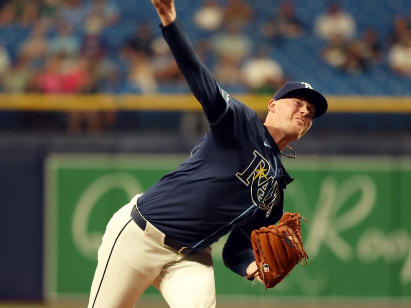 Apr 2, 2024; St. Petersburg, Florida, USA; Tampa Bay Rays relief pitcher Pete Fairbanks (29) throws a pitch during the ninth inning against the Texas Rangers at Tropicana Field. Mandatory Credit: Kim Klement Neitzel-USA TODAY Sports