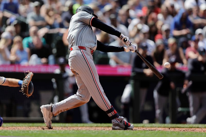 Jun 30, 2024; Seattle, Washington, USA; Minnesota Twins left fielder Trevor Larnach (9) hits a two-run home run gainst the Seattle Mariners during the eighth inning at T-Mobile Park. Mandatory Credit: John Froschauer-USA TODAY Sports