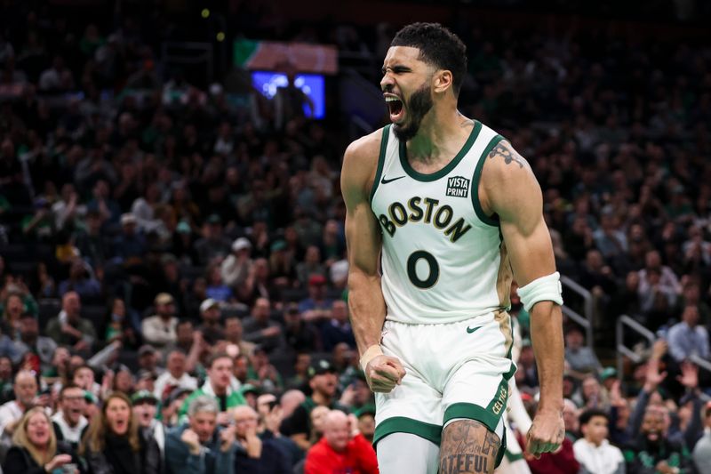 BOSTON, MA - FEBRUARY 27:  Jayson Tatum #0 of the Boston Celtics reacts after a dunk in the fourth quarter during a game against the Philadelphia 76ers at TD Garden on February 27, 2024 in Boston, Massachusetts. NOTE TO USER: User expressly acknowledges and agrees that, by downloading and or using this photograph, User is consenting to the terms and conditions of the Getty Images License Agreement. (Photo by Adam Glanzman/Getty Images)