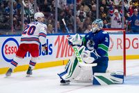 Vancouver Canucks and New York Rangers Lock Horns in a Close Contest