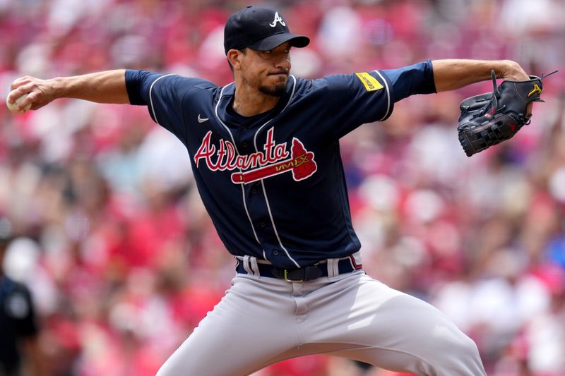 Jun 25, 2023; Cincinnati, Ohio, USA; Atlanta Braves starting pitcher Charlie Morton (50) delivers in the first inning of a baseball game against the Cincinnati Reds at Great American Ball Park. Mandatory Credit: Kareem Elgazzar-USA TODAY Sports