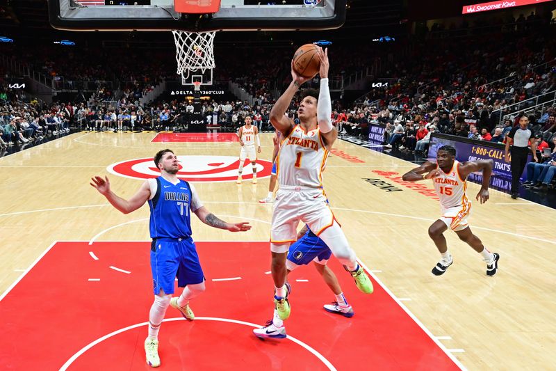 ATLANTA, GA - JANUARY 26: Jalen Johnson #1 of the Atlanta Hawks drives to the basket during the game against the Dallas Mavericks on January 26, 2024 at State Farm Arena in Atlanta, Georgia.  NOTE TO USER: User expressly acknowledges and agrees that, by downloading and/or using this Photograph, user is consenting to the terms and conditions of the Getty Images License Agreement. Mandatory Copyright Notice: Copyright 2024 NBAE (Photo by Adam Hagy/NBAE via Getty Images)