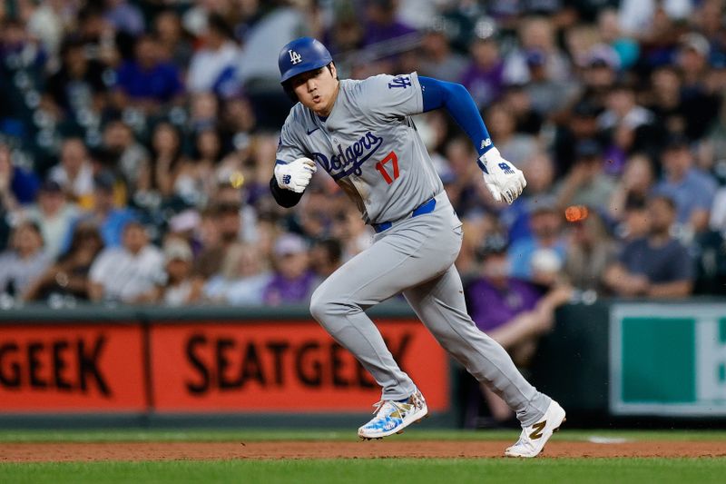 Sep 27, 2024; Denver, Colorado, USA; Los Angeles Dodgers designated hitter Shohei Ohtani (17) steals second in the second inning against the Colorado Rockies at Coors Field. Mandatory Credit: Isaiah J. Downing-Imagn Images