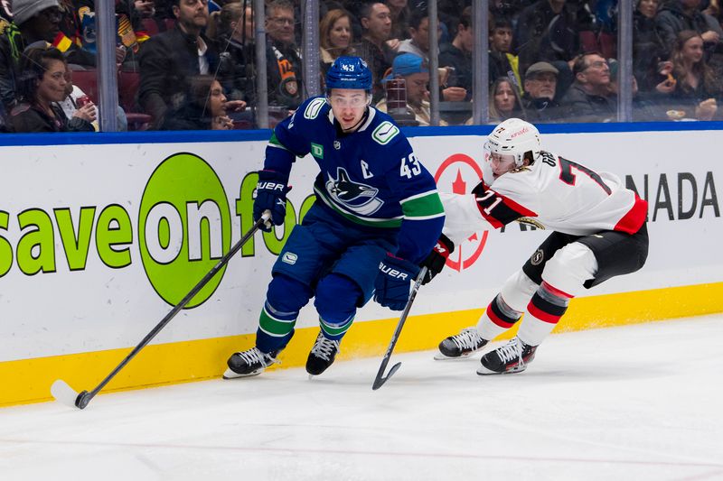 Jan 2, 2024; Vancouver, British Columbia, CAN; Ottawa Senators forward Ridly Greig (71) pursues Vancouver Canucks defenseman Quinn Hughes (43) in the second period at Rogers Arena. Mandatory Credit: Bob Frid-USA TODAY Sports