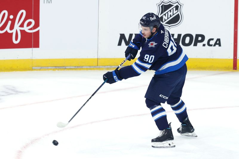 Sep 21, 2024; Winnipeg, Manitoba, CAN; Winnipeg Jets right wing Nikita Chibrikov (90) warms up before a preseason game against the Minnesota Wild at Canada Life Centre. Mandatory Credit: James Carey Lauder-Imagn Images