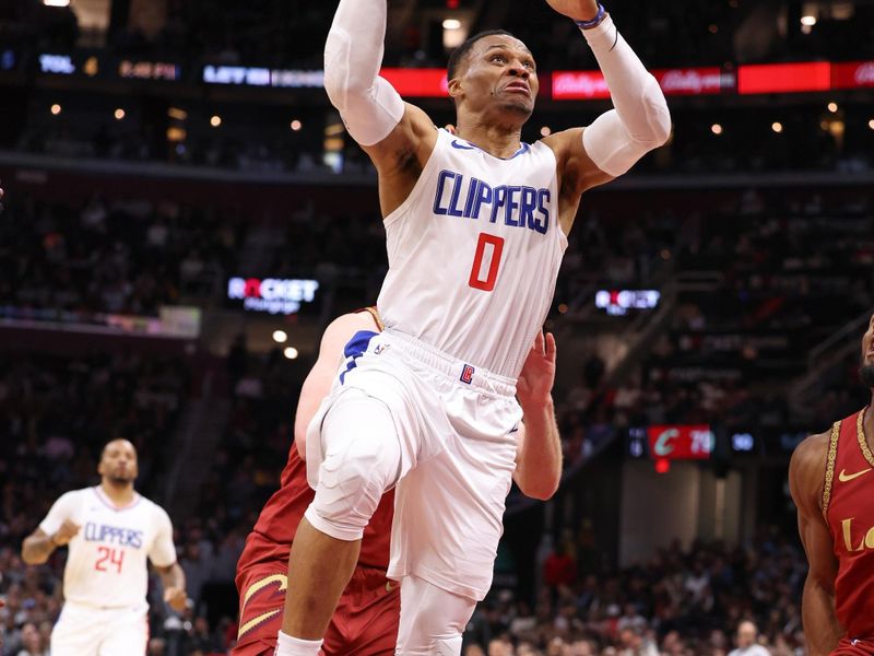 CLEVELAND, OH - JANUARY 29:  Russell Westbrook #0 of the LA Clippers goes to the basket during the game on January 29, 2024 at Rocket Mortgage FieldHouse in Cleveland, Ohio. NOTE TO USER: User expressly acknowledges and agrees that, by downloading and/or using this Photograph, user is consenting to the terms and conditions of the Getty Images License Agreement. Mandatory Copyright Notice: Copyright 2024 NBAE (Photo by  Lauren Leigh Bacho/NBAE via Getty Images)