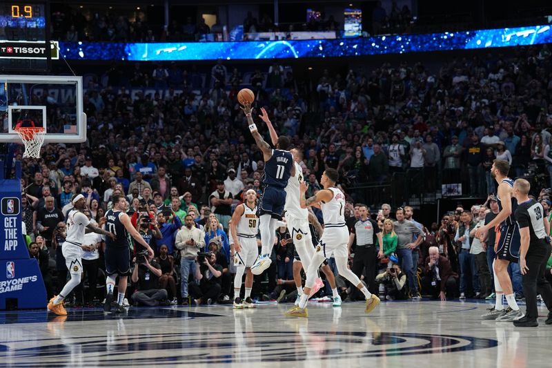 DALLAS, TX - MARCH 17: Kyrie Irving #11 of the Dallas Mavericks shoots the game winning basket against the Denver Nuggets on March 17, 2024 at the American Airlines Center in Dallas, Texas. NOTE TO USER: User expressly acknowledges and agrees that, by downloading and or using this photograph, User is consenting to the terms and conditions of the Getty Images License Agreement. Mandatory Copyright Notice: Copyright 2024 NBAE (Photo by Glenn James/NBAE via Getty Images)