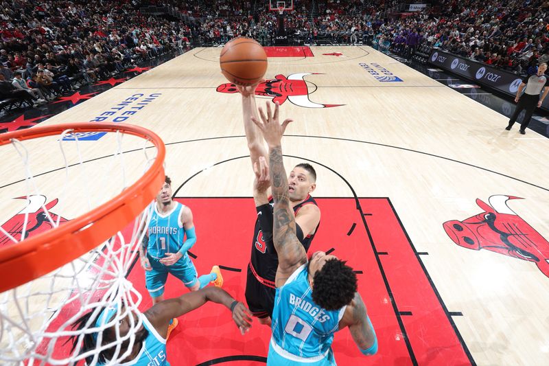 CHICAGO, IL - JANUARY 17: Nikola Vucevic #9 of the Chicago Bulls shoots the ball during the game against the Charlotte Hornets on January 17, 2025 at United Center in Chicago, Illinois. NOTE TO USER: User expressly acknowledges and agrees that, by downloading and or using this photograph, User is consenting to the terms and conditions of the Getty Images License Agreement. Mandatory Copyright Notice: Copyright 2025 NBAE (Photo by Jeff Haynes/NBAE via Getty Images)