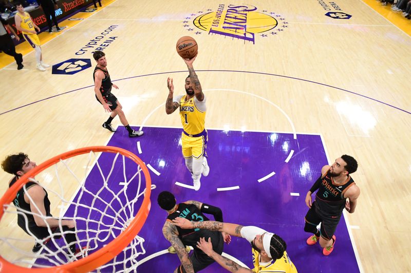 LOS ANGELES, CA - FEBRUARY 29: D'Angelo Russell #1 of the Los Angeles Lakers shoots the ball during the game against the Washington Wizards on February 29, 2024 at Crypto.Com Arena in Los Angeles, California. NOTE TO USER: User expressly acknowledges and agrees that, by downloading and/or using this Photograph, user is consenting to the terms and conditions of the Getty Images License Agreement. Mandatory Copyright Notice: Copyright 2024 NBAE (Photo by Adam Pantozzi/NBAE via Getty Images)