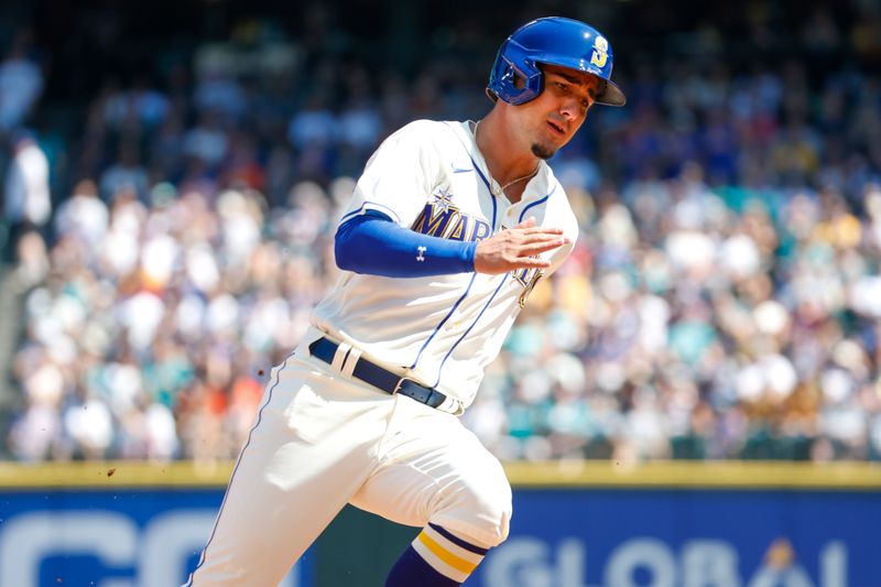 Aug 13, 2023; Seattle, Washington, USA; Seattle Mariners second baseman Josh Rojas (4) advances from second base to score a run against the Baltimore Orioles during the third inning at T-Mobile Park. Mandatory Credit: Joe Nicholson-USA TODAY Sports