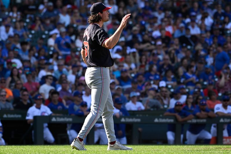 Sep 21, 2024; Chicago, Illinois, USA;  Washington Nationals pitcher Kyle Finnegan (67) reacts after a game against the Chicago Cubs at Wrigley Field. Mandatory Credit: Matt Marton-Imagn Images